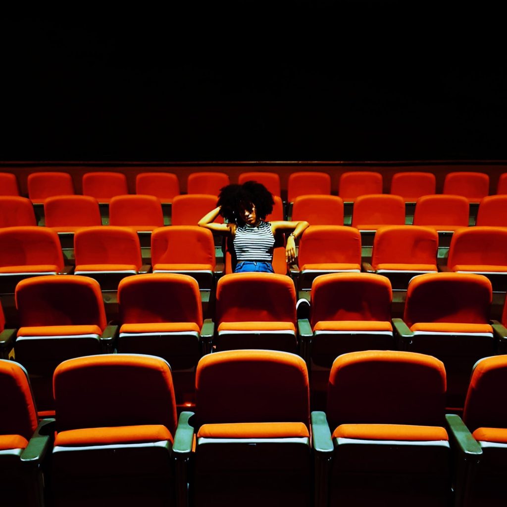 An audience member who is looks distracted in some way