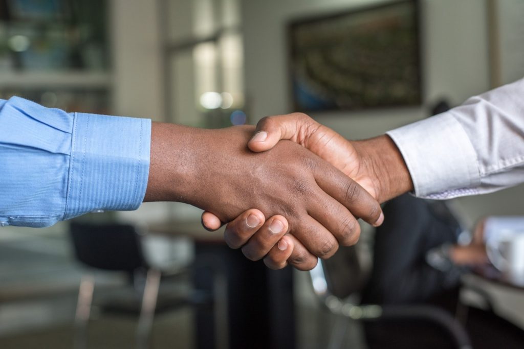 2 people networking in Toastmasters