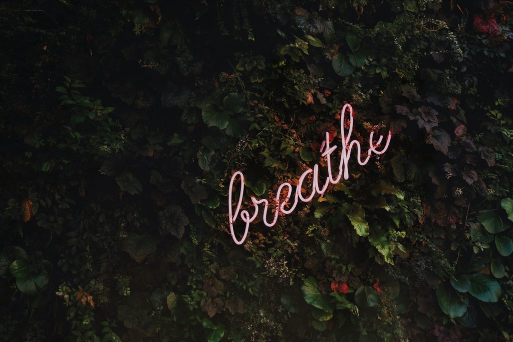 breathe and relax to loosen up your body before a speech or presentation