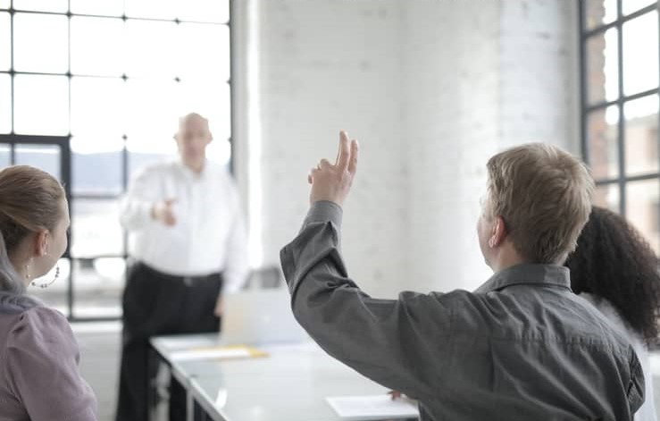Asking questions in a presentation. 